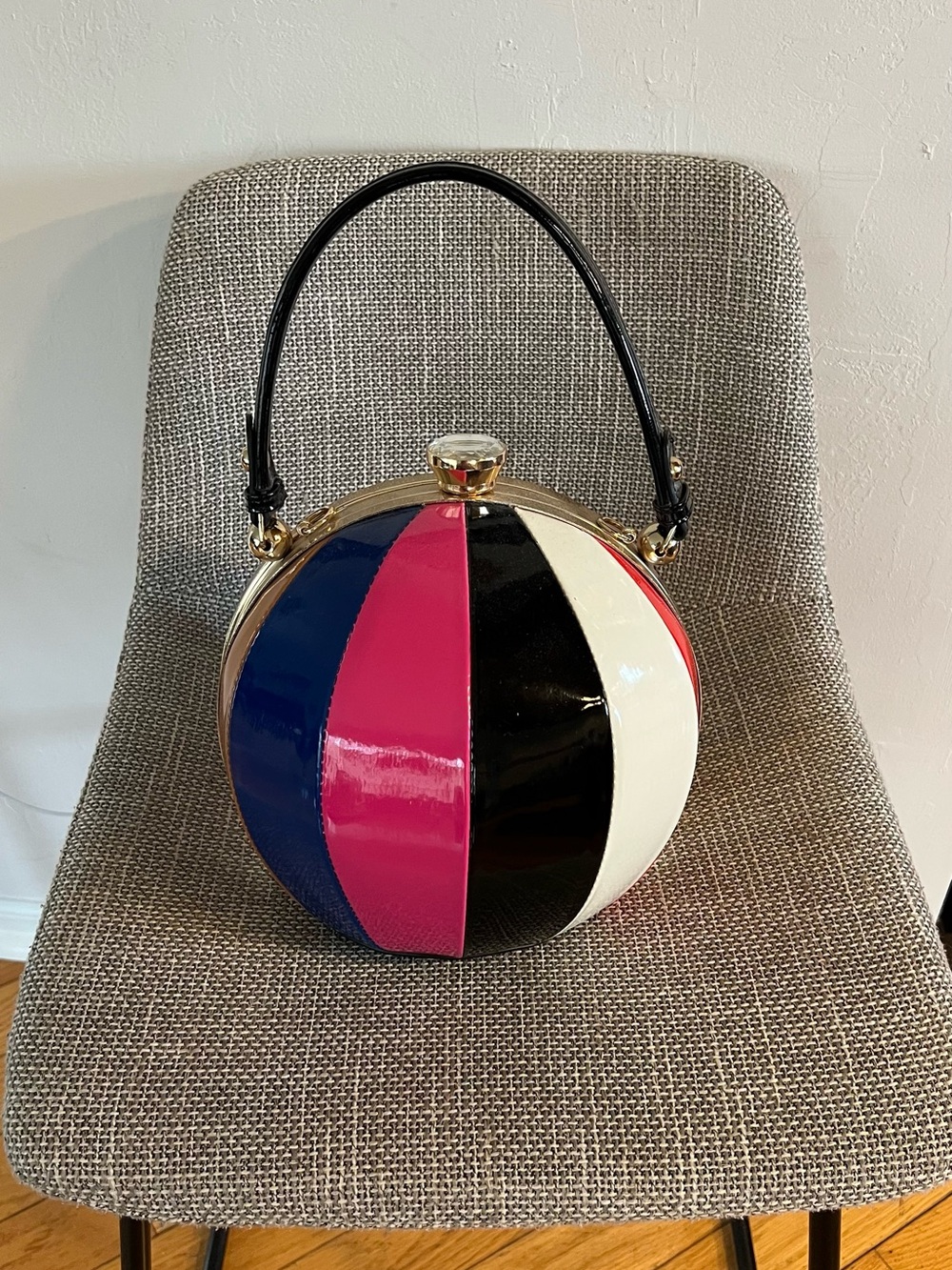 Round Patent Striped Wristlet Clutch in Pink, Blue, Black, and White